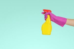 using-a-spray-bottle-with-gloves-on